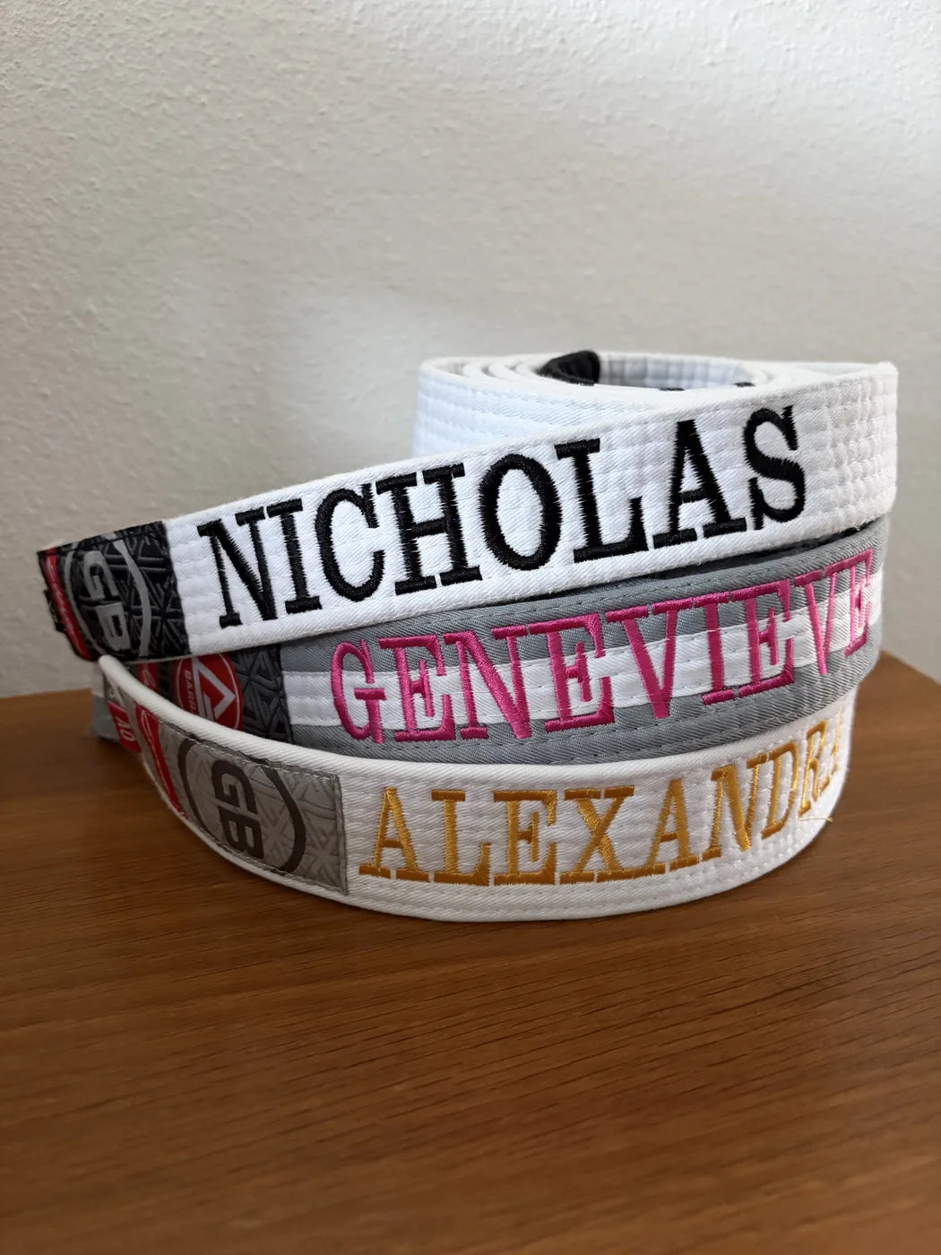 Three belts, one club